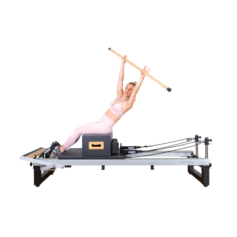 Align-Pilates A8-Pro Pilates Reformer woman exercising