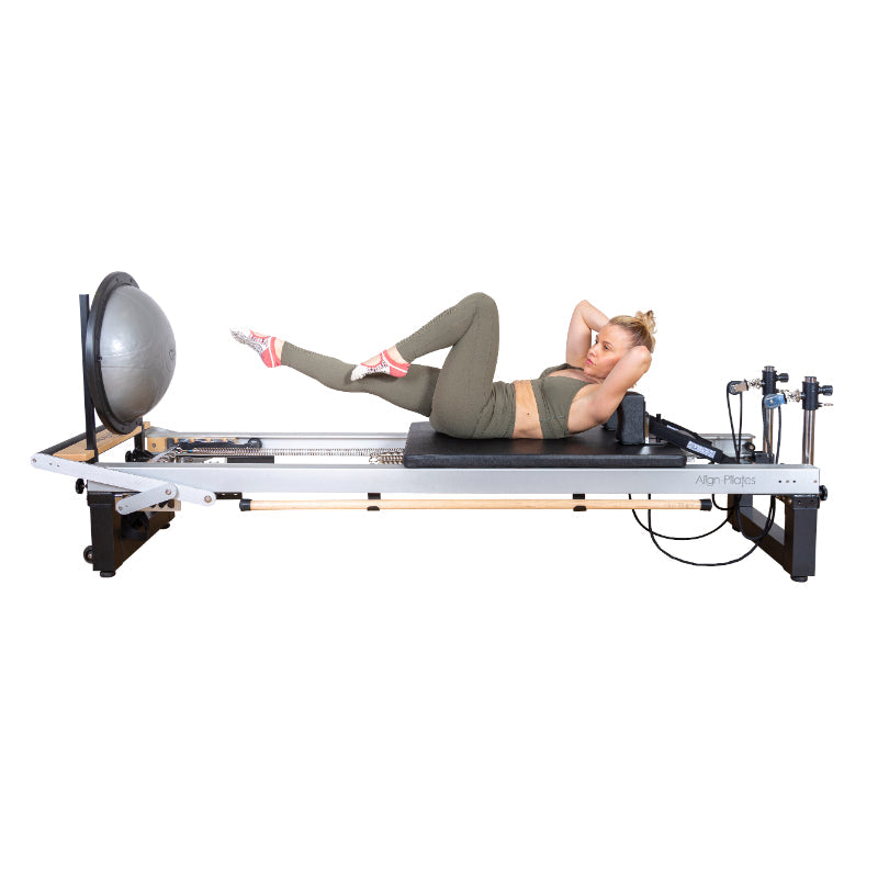 Align-Pilates A8-Pro Pilates Reformer woman on reformer