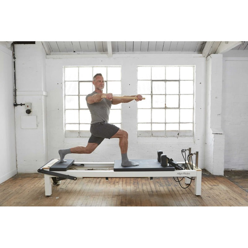 Align-Pilates C8-S Pro Pilates Reformer with man exercising