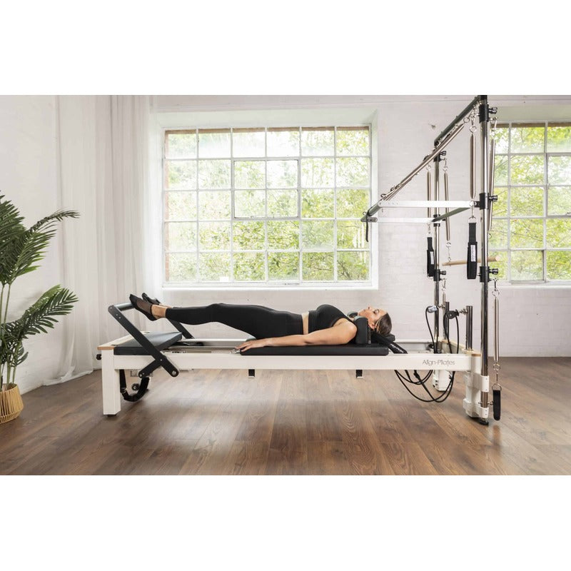 Align-Pilates C8-S Pro Pilates Reformer with woman exercising