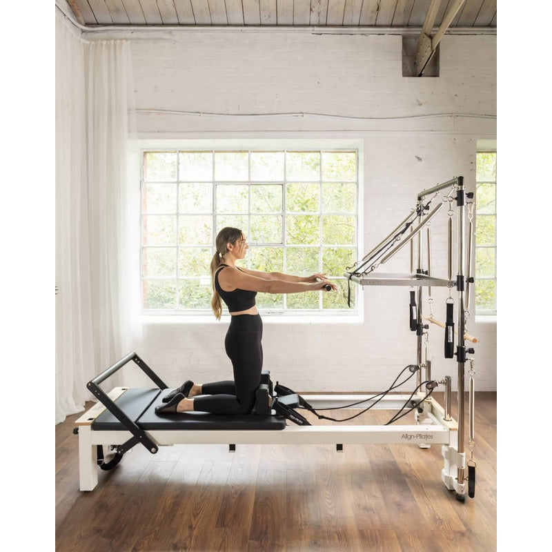 Align-Pilates C8-S Pro Pilates Reformer with girl exercising