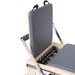 Elina Pilates Master Instructor Reformer in grey jumpboard