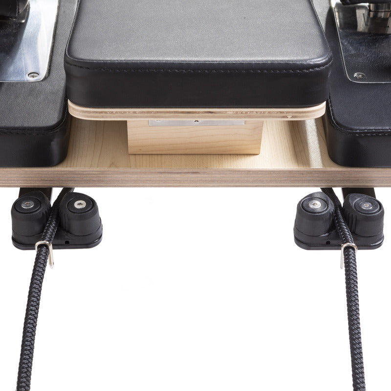 Elina Pilates Master Instructor Reformer in black pulley system