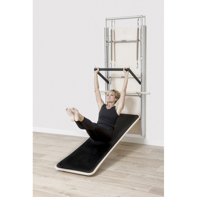 Elina Pilates Wall Board Onne woman using apparatus