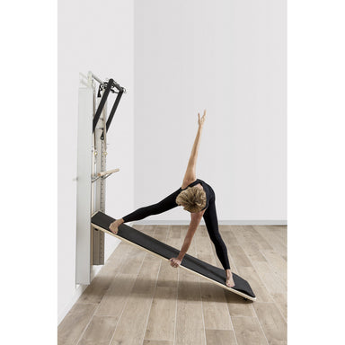 Elina Pilates Wall Board Onne woman stretching