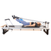 alighn pilates a8 pro reformer with girl exercising