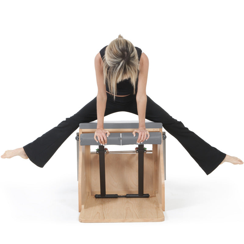 elina pilates wood combo chair in grey with woman